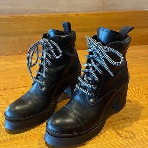 Miu Miu black leather hiking heeled boots. Made in Italy. US size 9. Well-made!